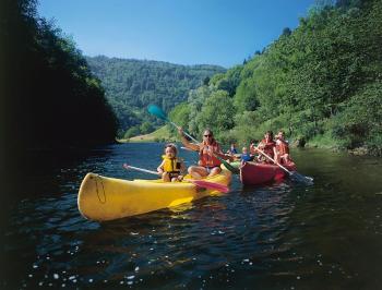 tgv lyria family travel on a swiss river in summer