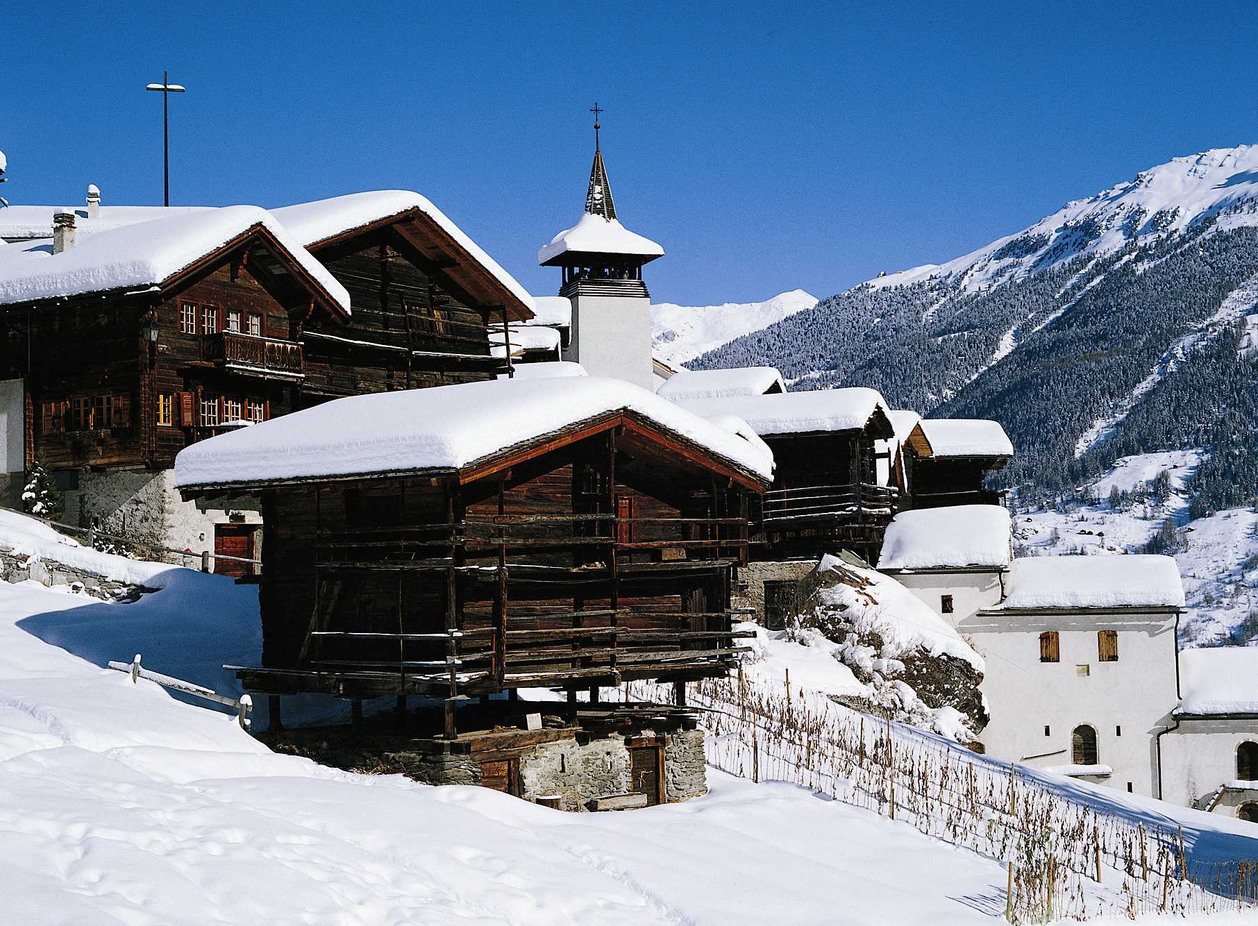 tgv lyria snowy winter in swiss village and moutain
