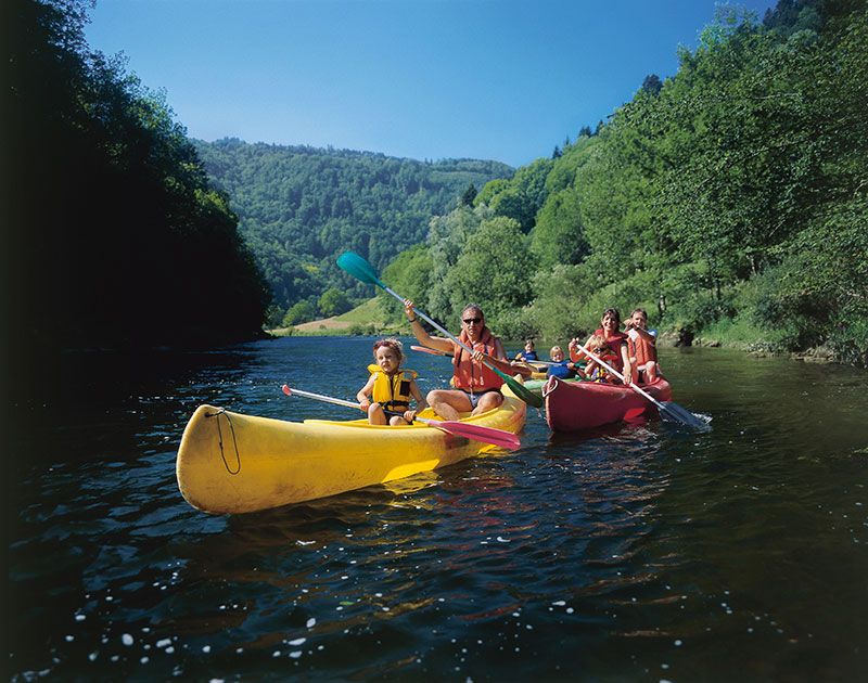 tgv lyria family travel on a swiss river in summer