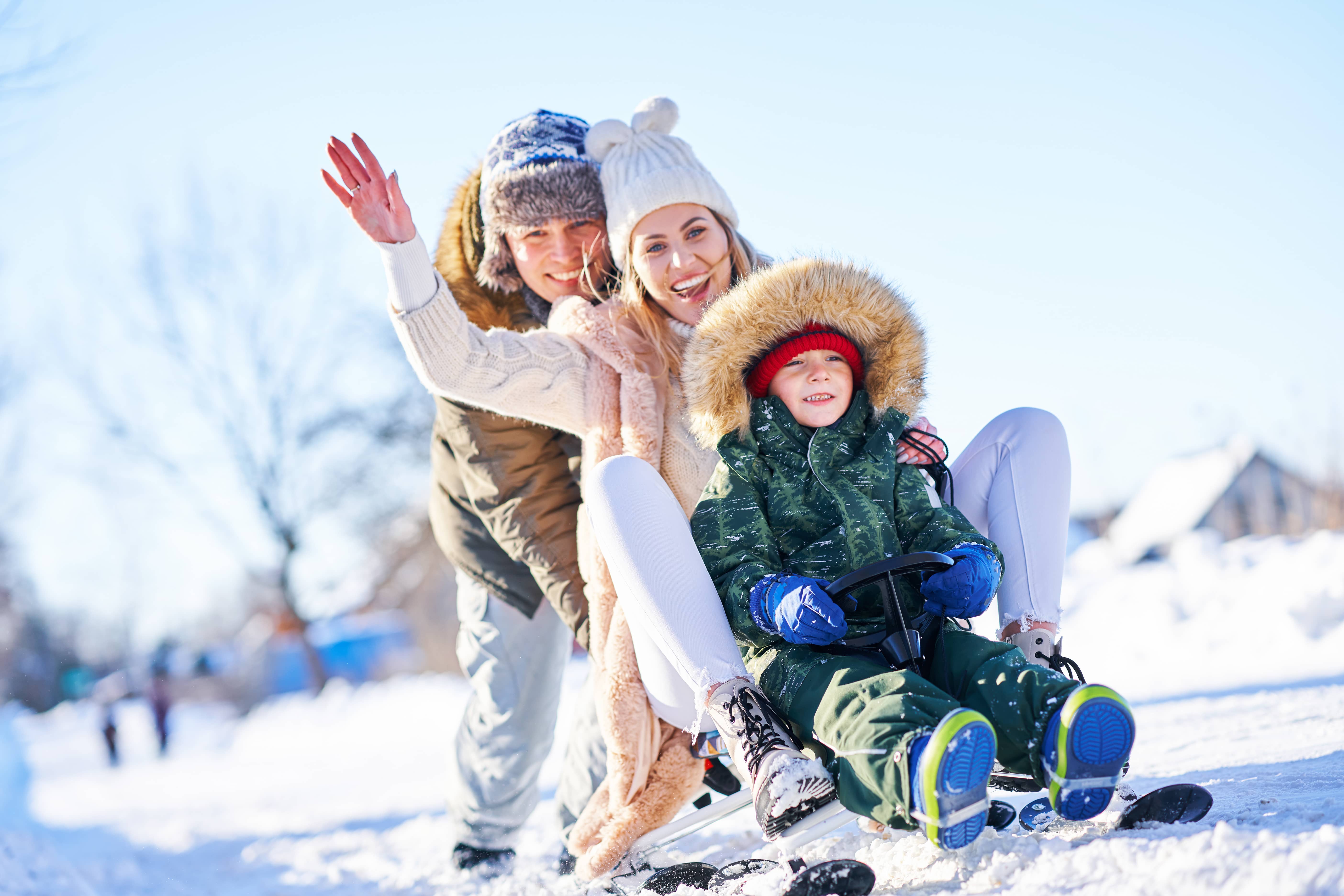 tgv lyria happy family having fun on winter snow