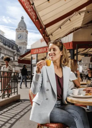 tgv lyria woman on the terrace in front of the station