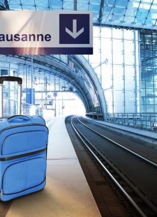 TGV Lyria - Lausanne train station with luggage