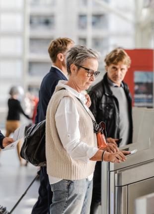 tgv lyria passengers on the platform boarding the train