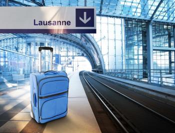 TGV Lyria - Lausanne train station with luggage