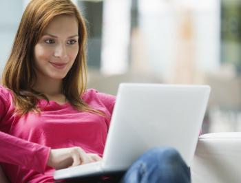 tgv lyria woman with a computer