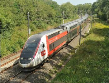 TGV Lyria - running train in the woods