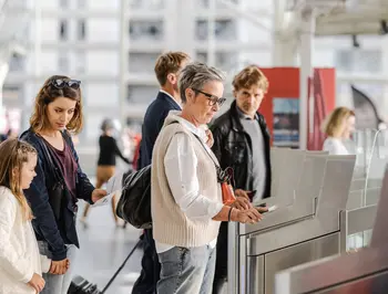 tgv lyria passengers on the platform boarding the train