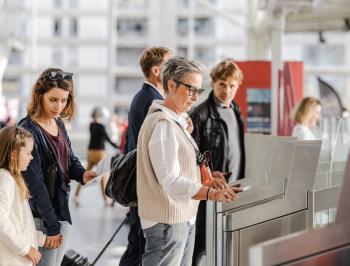 tgv lyria passengers on the platform boarding the train