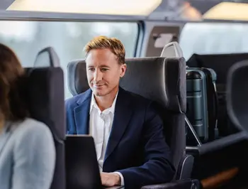 tgv lyria business traveller on his computer