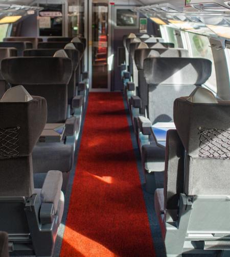 TGV Lyria - Train seats in a 1st class coach for BUSINESS 1ERE and STANDARD 1ERE