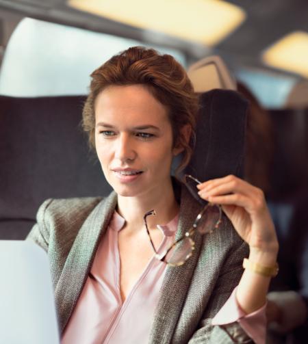 A business traveller in the TGV Lyria