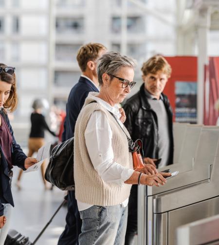 tgv lyria passengers on the platform boarding the train