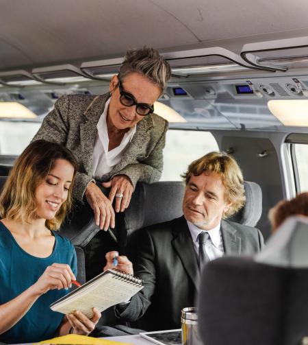 tgv lyria group of people in train