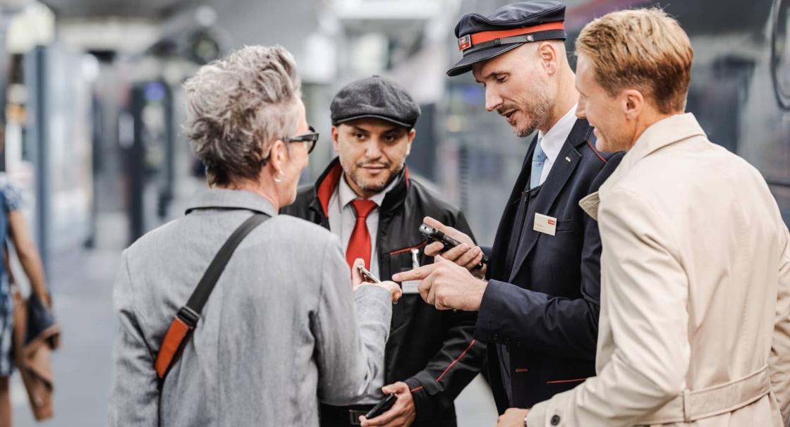 tgv lyria train manager on station platform