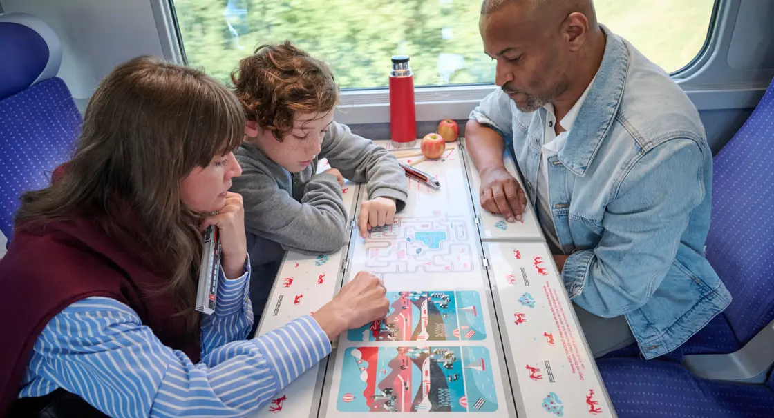 Famille à bord de TGV Lyria