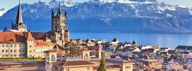 Lausanne cathedral and mountains