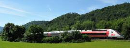 TGV Lyria - running train in the nature